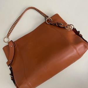 Leather Tote with missing grommet